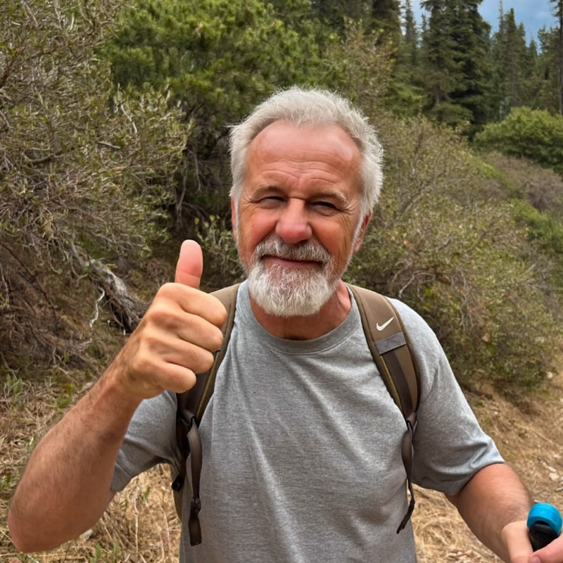 Active man hiking outdoors, enjoying life without medication side effects